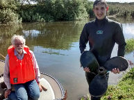 Leon Crisp retrieves Suns lost propeller from the mucky river Hull