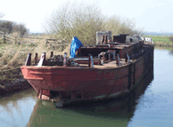 Syntan passing old Barge